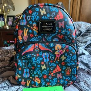 Loungefly Coco Remember Me AOP Mini Backpack